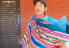 En Tarija un hombre con su bebe en brazos lucha por su familia